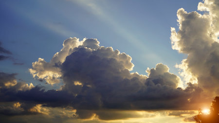 Golden sunset sky background, golden clouds, evening with the sun setting, clear sky, amazing...