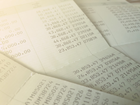 personal saving passbook business background with closeup viewの写真素材
