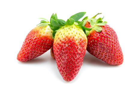 Strawberries with leaves. Isolated on a white background.の写真素材