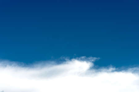 blue sky background with cloudsの写真素材