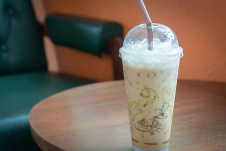 Ice coffee on wood table