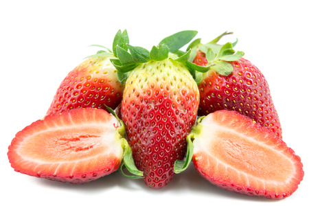 Strawberries with leaves. Isolated on a white background.の写真素材