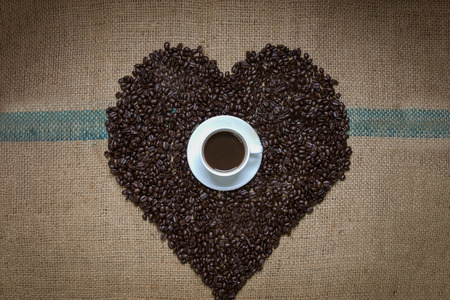 Cup of coffee  with  coffee beansの写真素材