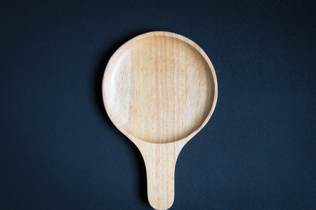 Wood plate on wooden tableの写真素材