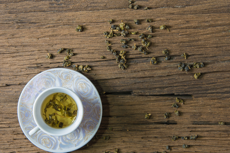 Tea cup on wooden tableの写真素材