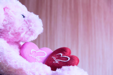 teddy Bear with Heart on wood background,concept valentineの写真素材