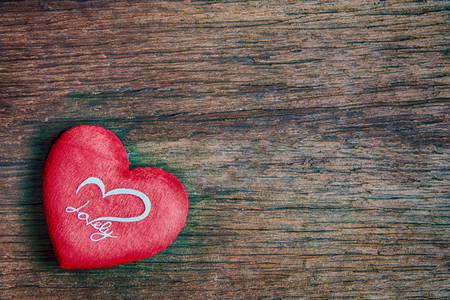 Heart on wooden table concept of Valentine's Dayの写真素材