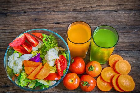 healthy foods are on the table, Fresh vegetable salad in a glass bowの写真素材