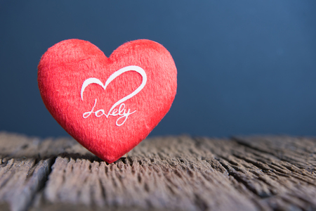 Valentines Day background with heart, Red heart on the wooden backgroundの写真素材