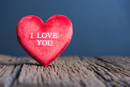 Valentines Day background with heart, Red heart on the wooden backgroundの写真素材