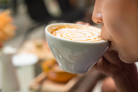 woman enjoying coffee time, woman drinking coffeeの写真素材