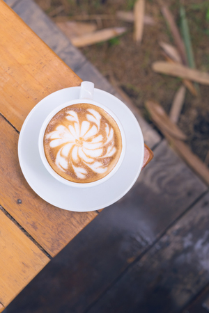 coffee cup on wooden tableの写真素材