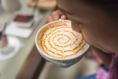 woman enjoying coffee time, woman drinking coffeeの写真素材
