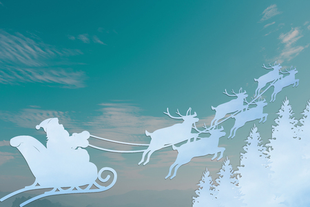 Santa Claus Driving in a Sledge on green backgroundの写真素材