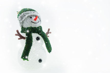 Christmas background with Christmas tree and snowman. Christmas decoration Holiday or new year with snowman on snow background and copy space.の写真素材