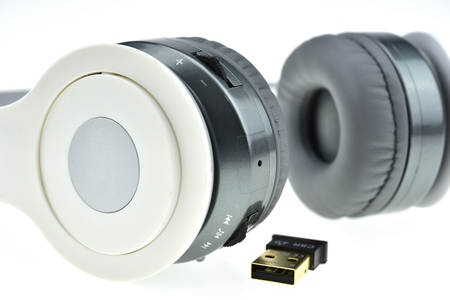 Wireless headphones with Mini USB Adapter V4.0 isolated on a white background,  white headphoneの写真素材