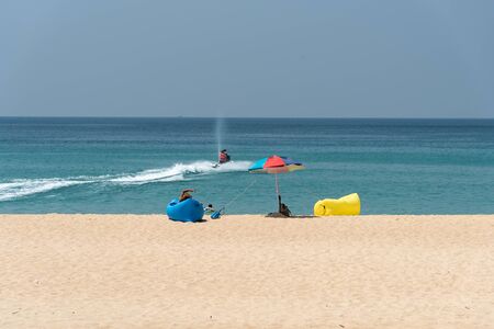 Summer beach paradise. Tropical island beach. Sea shore line. Island relax landscape travel conceptの写真素材