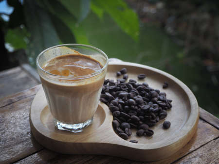 dirty coffee cup in cafe bar (espresso coffee with milk)