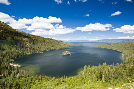 Emerald Bay with beautiful cloudy sky and green tree in the foreground, South Lake Tahoe, California, USAの写真素材