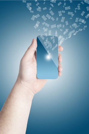 Man s hand holding on the touch screen mobile phone with 3D mail icon coming out from screen on blue backgroundの写真素材
