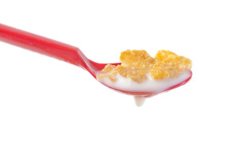 Close up on red and corn flakesの写真素材