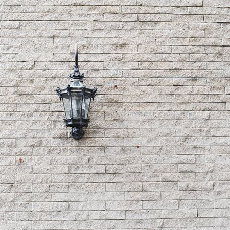 Lamp on old brick wallの写真素材