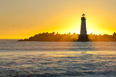 Windsurf and Silhouette Lighthouseの写真素材