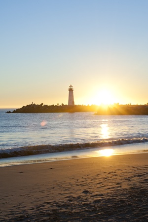 Windsurf and Silhouette Lighthouseの写真素材