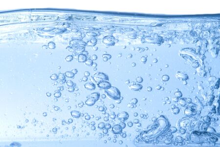 Clean water and water bubbles on blue colorの写真素材