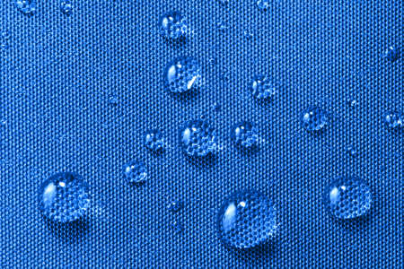  Water drop on blue backgroundの写真素材