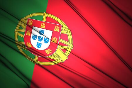 Portugal Flag lit by sunlight in the backgroundの写真素材