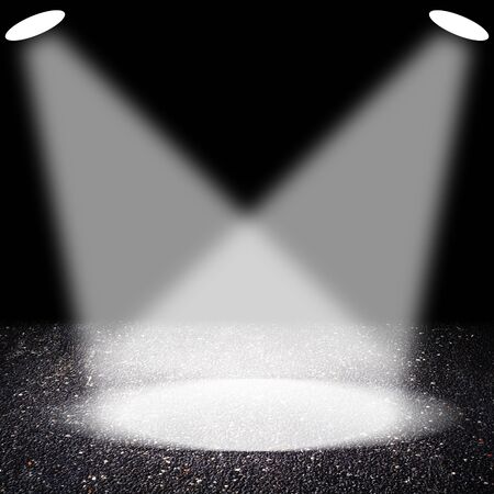 Spotlights on asphalt floorの写真素材