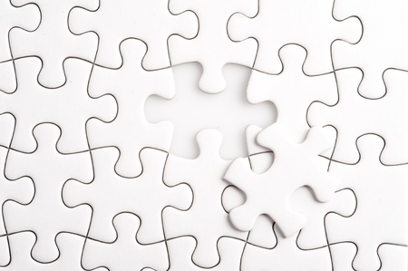 Missing Jigsaw puzzle in red color jigsaw  Business concept for completing team with key personの写真素材