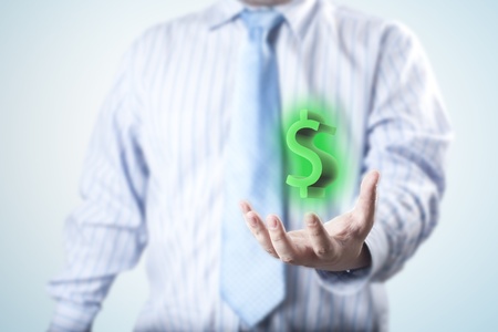 Green Dollar sign floating on the businessman s hand  Concept for business profitの写真素材