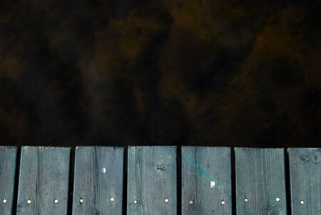 Wood walkway on waterの写真素材