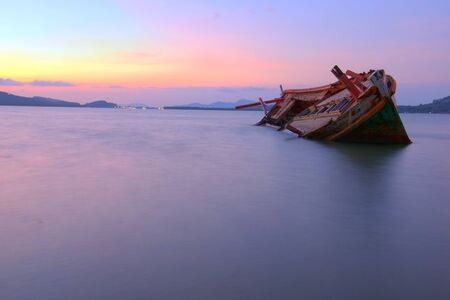Old boat damage on ocean