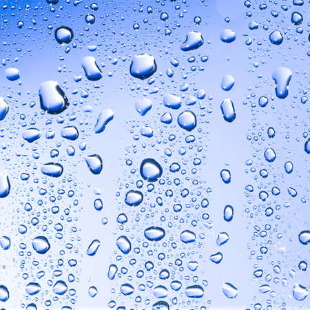 Water drop on blue background