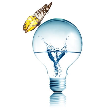 Water inside light bulb with butterfly on topの写真素材