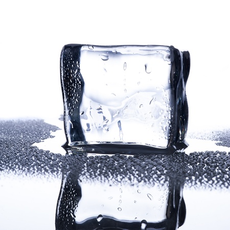 Ice cube with water droplets