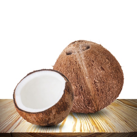 Coconut on wood tableの写真素材