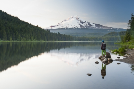 The volcano mountain Mt  Hood, in Oregon, USA  At sunset with reflection on the water of the Trillium lake の写真素材
