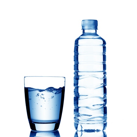 Glass of water with water bottleの写真素材