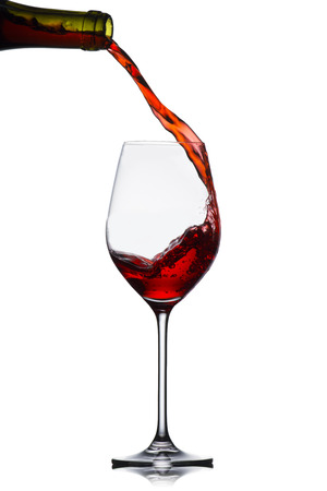 Red wine pouringの写真素材