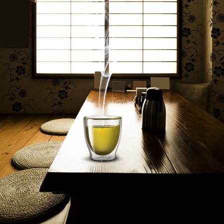 Glass of Tea on wood tableの写真素材