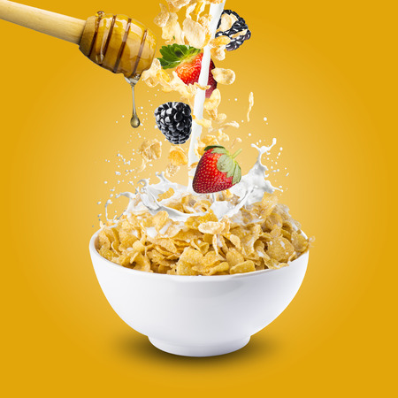Milk Splash and Corn Flakes With Honey Dripの写真素材