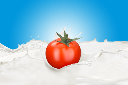 Fresh Tomato With Milk Splashの写真素材