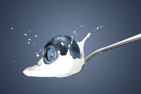 Fresh Blueberry With Milk Splashの写真素材