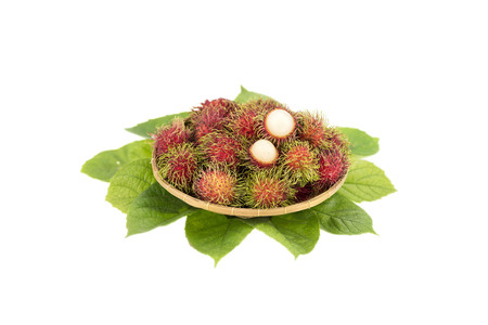 asian fruit rambutan in basketの写真素材