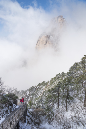 China-January 15,Tourists walking around Huangchan mountain in holiday on January 15,2013 in Hefei Chinaのeditorial素材