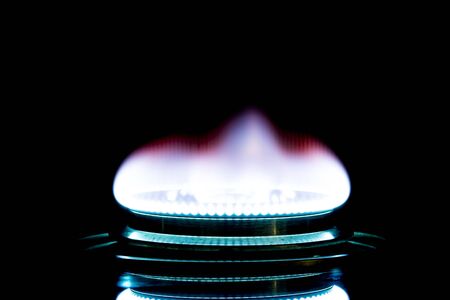 Blur photography,Home LPG.firing.Burning gas burner in the darkness.Natural energy concept.の写真素材